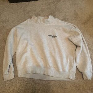 Essentials Mockneck Oatmeal Size: M